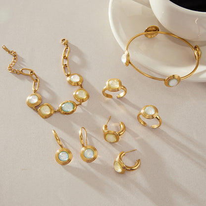 Luminous Resin Geometric Gold Jewelry Collection